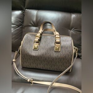 Michael Kors signature logo satchel.